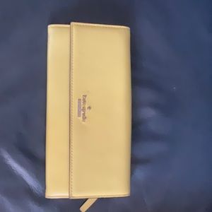 Kate Spade yellow wallet great condition.